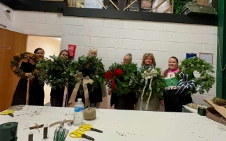 Christmas wreath making workshop at The Grapevine Bar in Romiley, with guests creating fresh foliage wreaths, enjoying mulled wine and mince pies. 3rd December 2025, 6PM. 